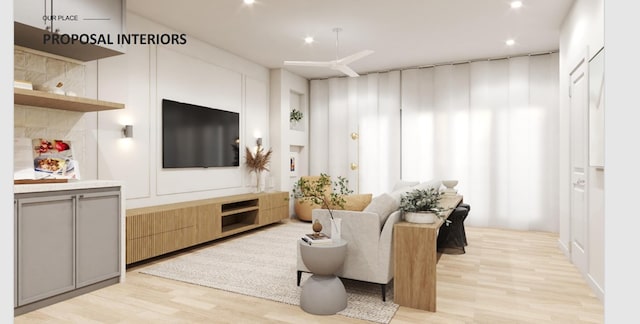 living area with light wood-style floors and recessed lighting