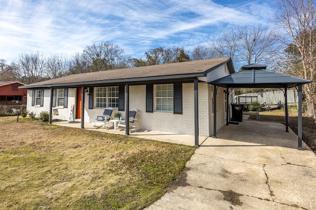 single story home featuring a gazebo, a porch, and a front yard