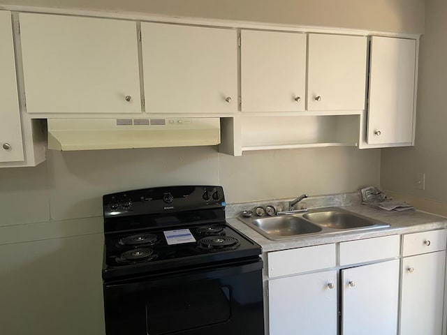 kitchen with white cabinets, extractor fan, black range with electric stovetop, and sink