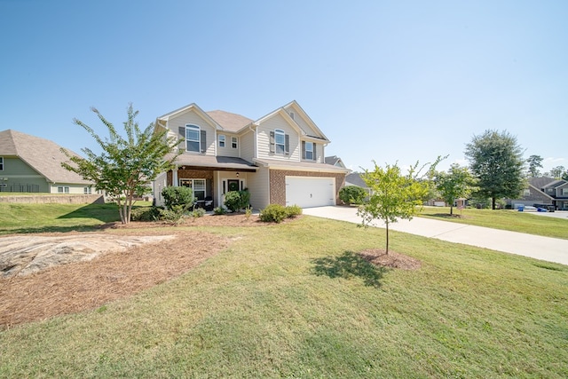 view of front of house with a garage and a front lawn