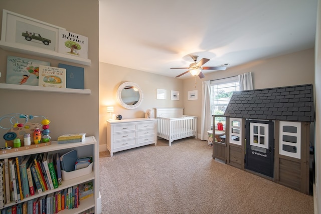 carpeted bedroom featuring ceiling fan