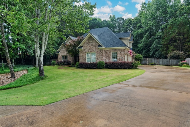 5043 Spyglass Ct, Columbus, GA 31909 - view of front of home featuring concrete driveway, brick siding, and a shingled roof