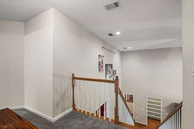5043 Spyglass Ct, Columbus, GA 31909 - staircase with baseboards, recessed lighting, and a textured ceiling