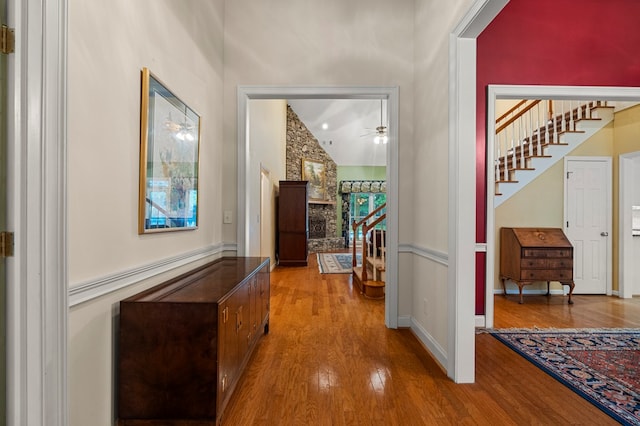 5043 Spyglass Ct, Columbus, GA 31909 - corridor featuring wood finished floors, stairway, baseboards, and vaulted ceiling