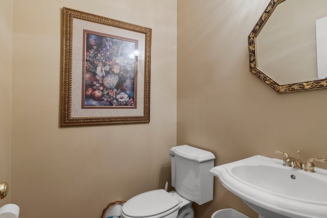 5043 Spyglass Ct, Columbus, GA 31909 - half bathroom featuring a sink and toilet