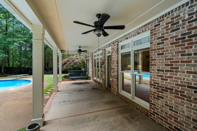 5043 Spyglass Ct, Columbus, GA 31909 - view of patio featuring ceiling fan and an outdoor pool