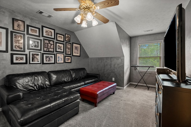 5043 Spyglass Ct, Columbus, GA 31909 - carpeted living area with a ceiling fan, a textured ceiling, baseboards, and lofted ceiling