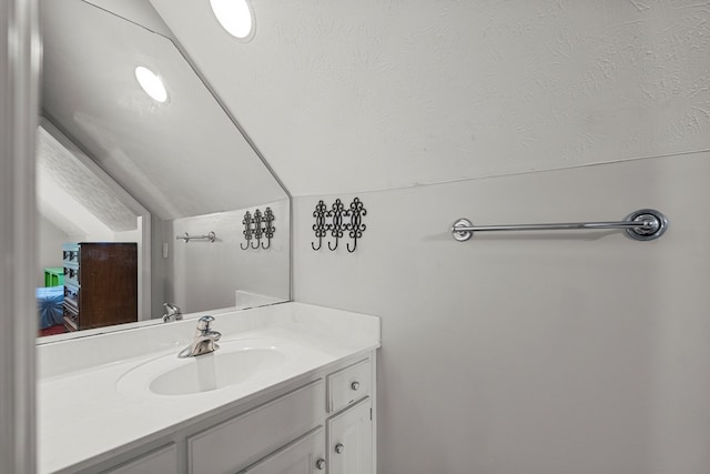 5043 Spyglass Ct, Columbus, GA 31909 - bathroom with vanity and vaulted ceiling