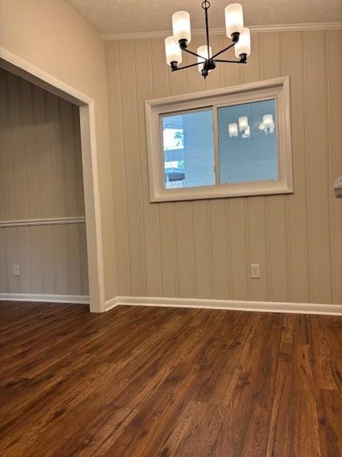 5435 Mariner Dr, Columbus, GA 31909 - unfurnished dining area with a chandelier, dark wood finished floors, and crown molding
