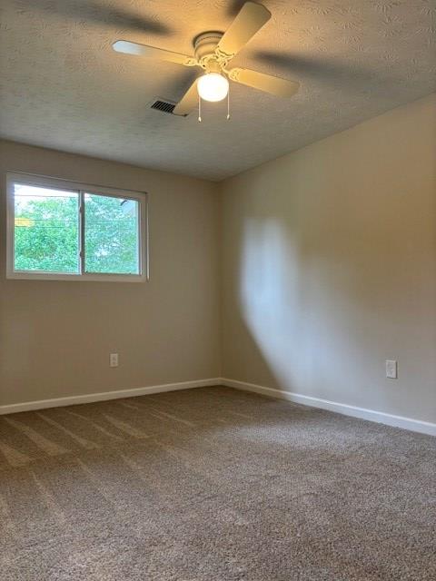 5435 Mariner Dr, Columbus, GA 31909 - carpeted spare room featuring a textured ceiling and ceiling fan