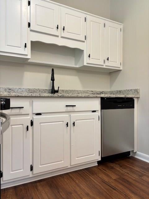 5435 Mariner Dr, Columbus, GA 31909 - kitchen with stainless steel dishwasher, white cabinetry, light stone countertops, and dark wood finished floors