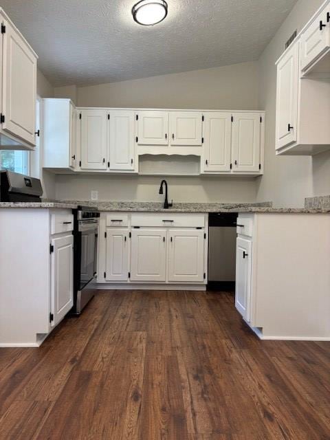 5435 Mariner Dr, Columbus, GA 31909 - kitchen featuring white cabinetry, a textured ceiling, dark wood-style flooring, and light stone counters