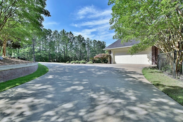 view of road with driveway