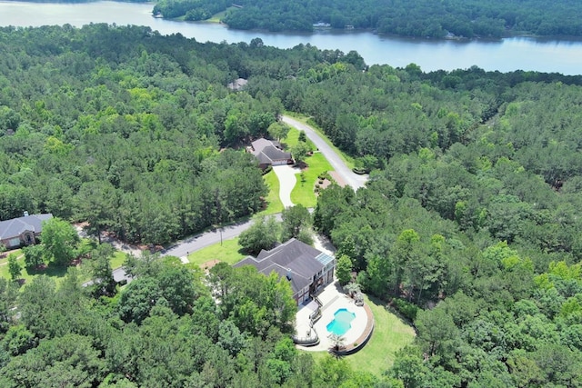 bird's eye view featuring a water view and a wooded view