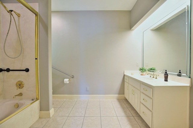 bathroom with tile patterned flooring, shower / bath combination, vanity, and baseboards