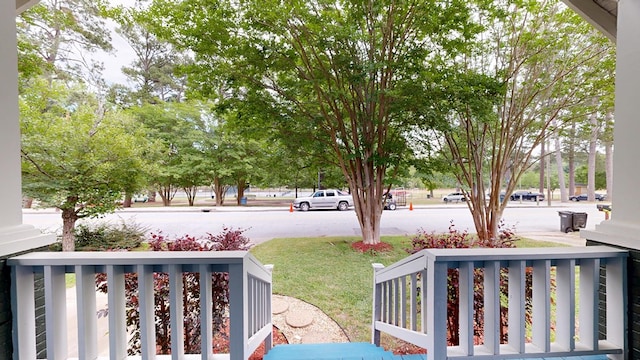 wooden terrace with a porch