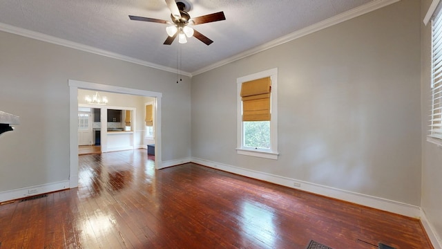 spare room with wood-type flooring, a ceiling fan, baseboards, and ornamental molding