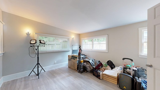 miscellaneous room featuring light wood-style floors and baseboards
