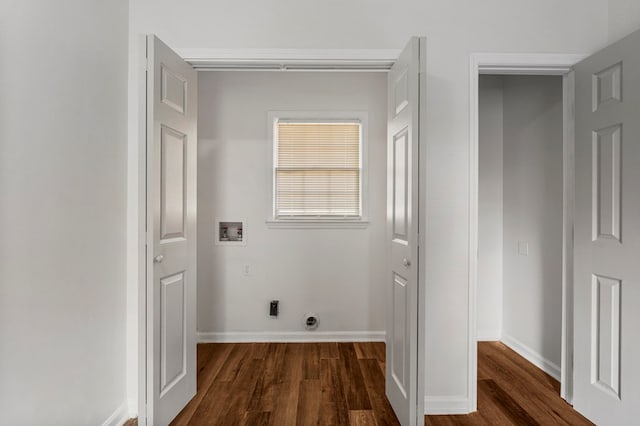 laundry room featuring laundry area, baseboards, washer hookup, and dark wood-type flooring