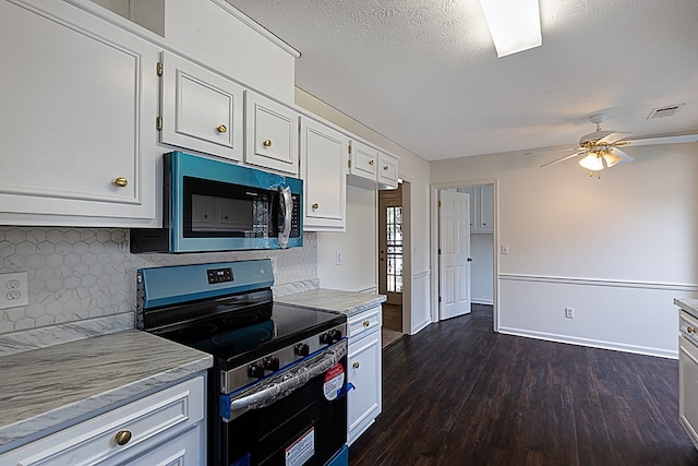 kitchen featuring backsplash, a textured ceiling, black range with electric cooktop, ceiling fan, and white cabinets