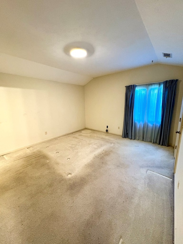 5302 Pine Needle Dr, Columbus, GA 31907 - carpeted empty room featuring vaulted ceiling