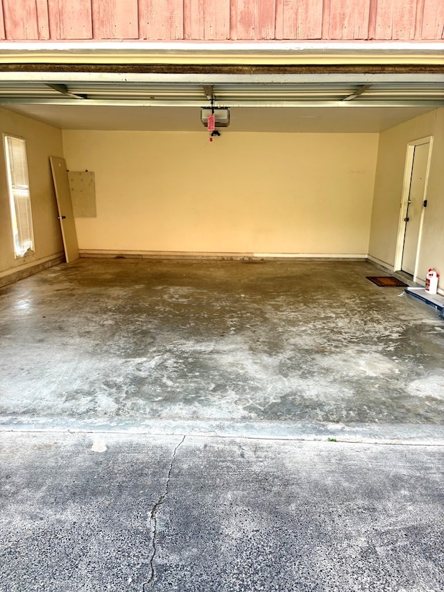 5302 Pine Needle Dr, Columbus, GA 31907 - garage featuring a garage door opener
