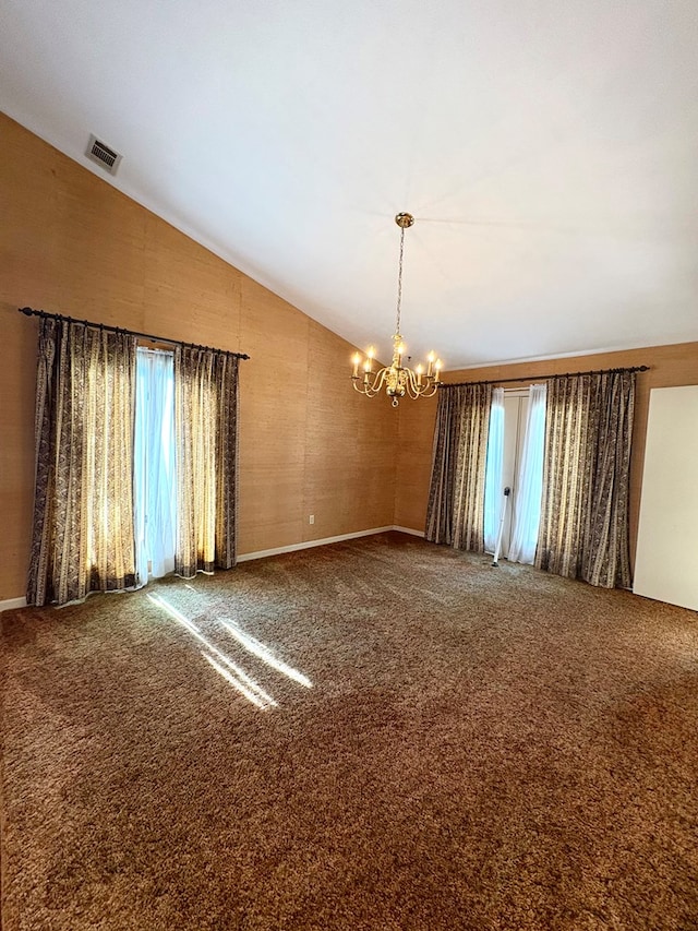 5302 Pine Needle Dr, Columbus, GA 31907 - carpeted spare room with vaulted ceiling and a chandelier