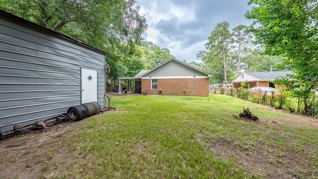 5608 Grove Ave, Columbus, GA 31904 - view of yard with view of wooded area