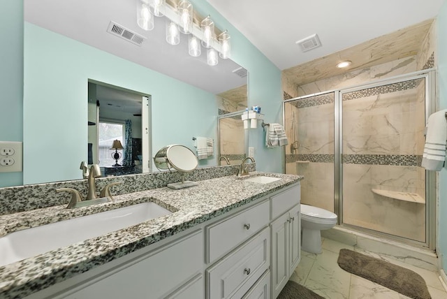 5608 Grove Ave, Columbus, GA 31904 - bathroom featuring marble finish floors, a stall shower, and double vanity