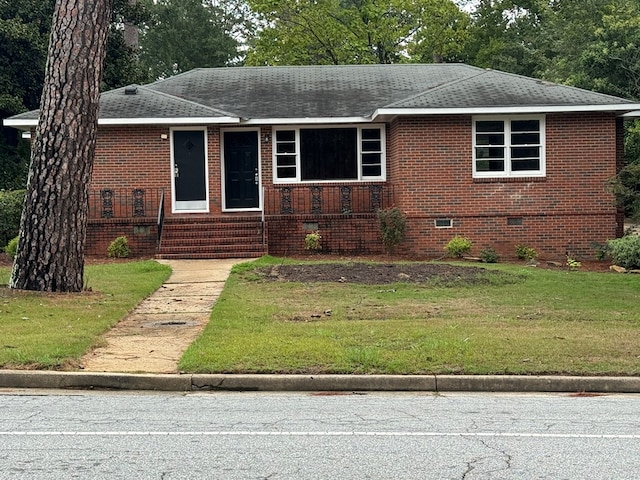 view of front of house with a front yard