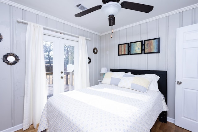 bedroom featuring french doors, access to outside, ornamental molding, dark hardwood / wood-style floors, and ceiling fan