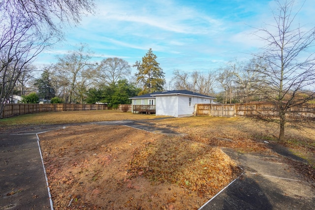 view of yard with a deck