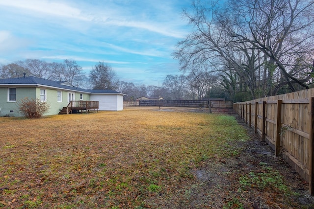 view of yard with a deck