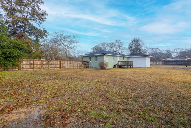 view of yard with a deck