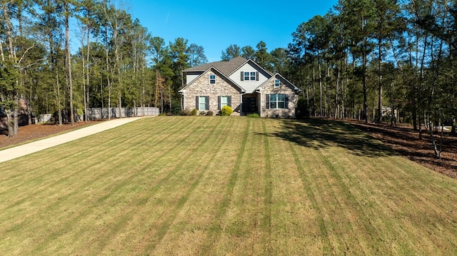 craftsman house with a front yard