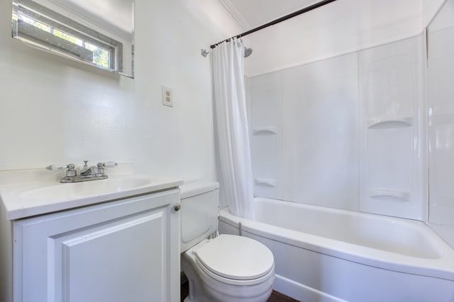 full bathroom with vanity, toilet, and shower / bath combo with shower curtain