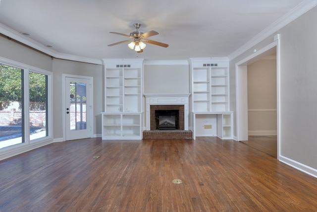 unfurnished living room with crown molding, ceiling fan, a fireplace, and dark hardwood / wood-style flooring