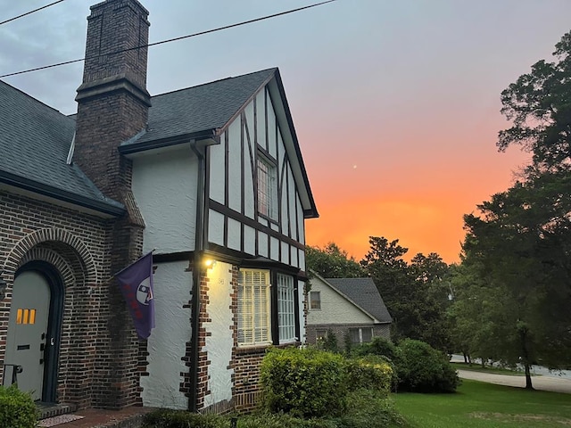 view of property exterior at dusk