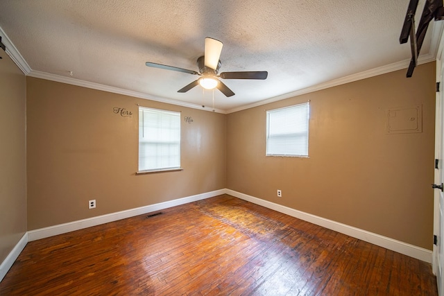 unfurnished room with hardwood / wood-style floors, a healthy amount of sunlight, and a textured ceiling