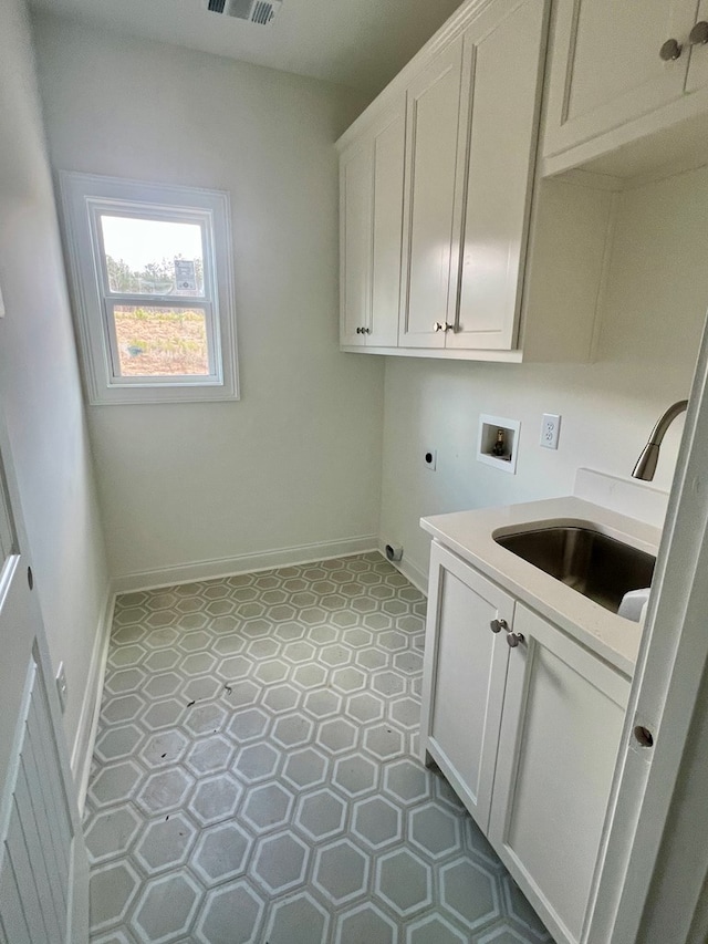 laundry room featuring cabinets, washer hookup, hookup for an electric dryer, and sink