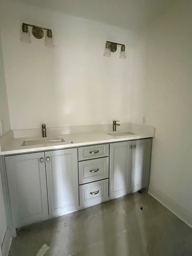 interior space featuring gray cabinets and sink