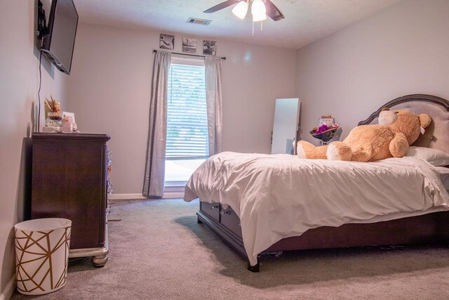 7265 E Wynfield Loop, Midland, GA 31820 - carpeted bedroom with ceiling fan and baseboards