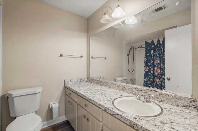 full bathroom featuring vanity, baseboards, visible vents, curtained shower, and toilet