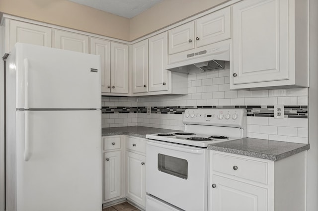 kitchen with under cabinet range hood, decorative backsplash, white cabinets, and white appliances