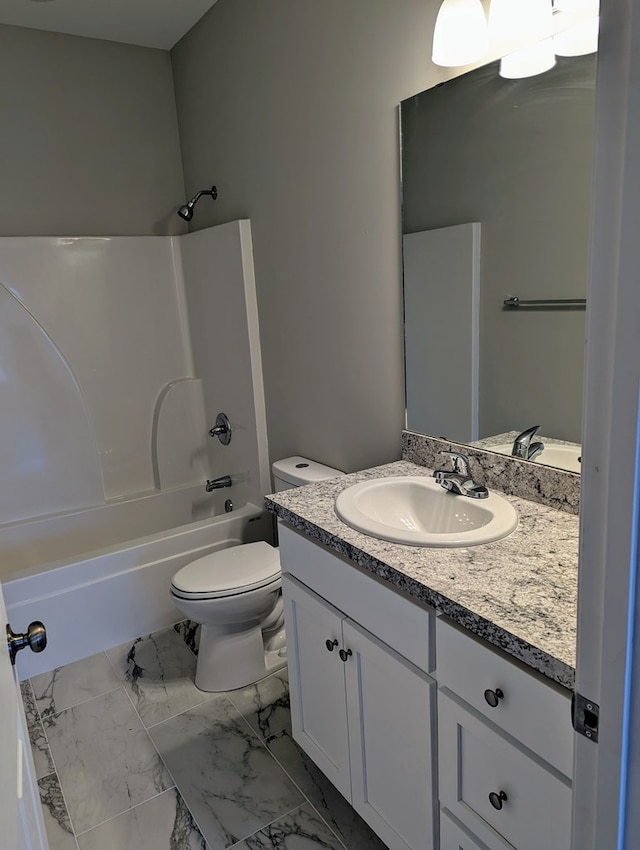 full bathroom featuring vanity, shower / washtub combination, and toilet