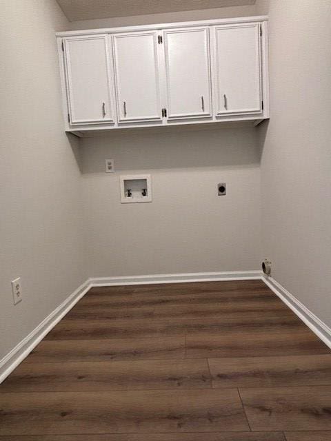 laundry room with washer hookup, cabinet space, dark wood finished floors, and electric dryer hookup