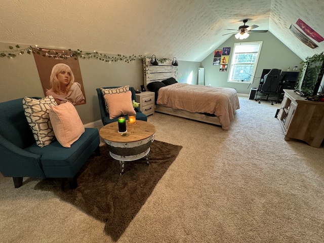 bedroom featuring carpet flooring, ceiling fan, a textured ceiling, and vaulted ceiling