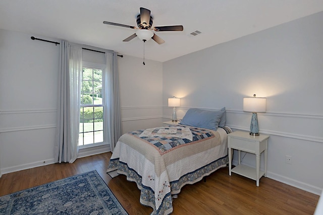 7191 Otter Dr, Midland, GA 31820 - bedroom with wood finished floors, a ceiling fan, and baseboards