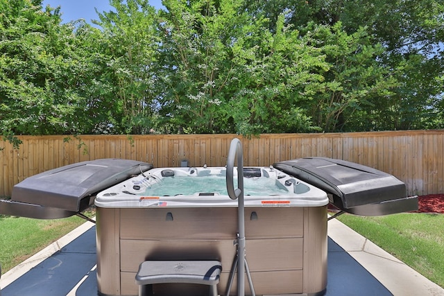 7191 Otter Dr, Midland, GA 31820 - view of patio / terrace with a hot tub