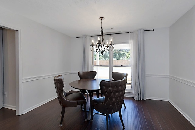 7191 Otter Dr, Midland, GA 31820 - dining space with a chandelier, dark wood-style floors, and baseboards